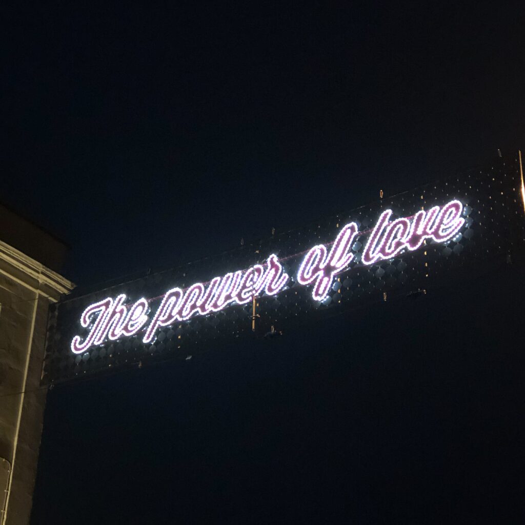 The power of love - a neon sign against a dark night sky, Colchester.