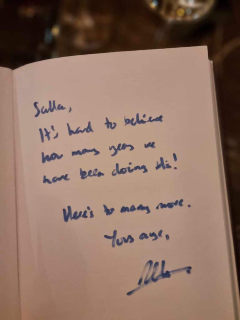 Alan's signed message in the front of Salla Saarinen's copy of his book. "It's hard to believe how long we have been doing this! Here's to many more".